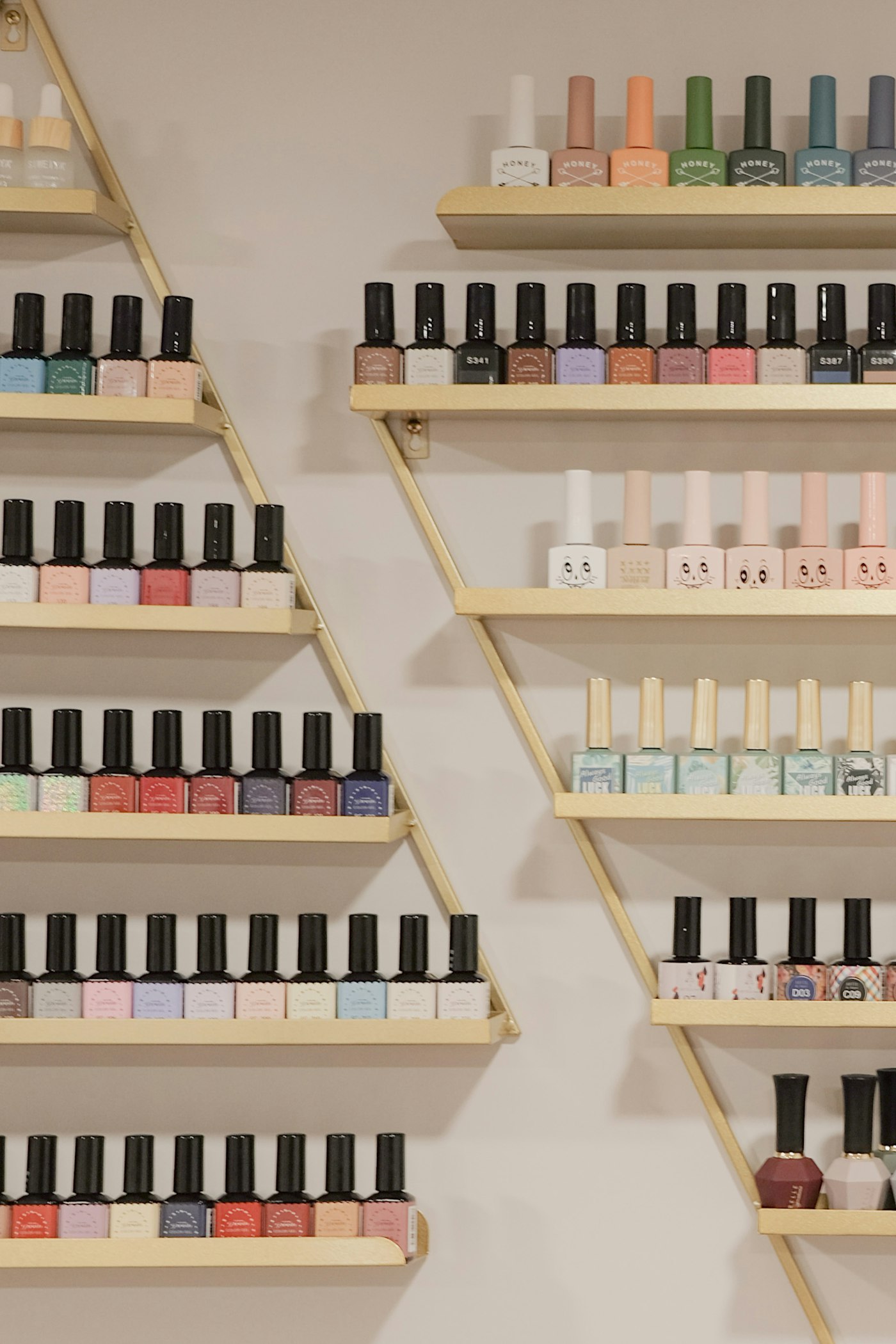 Shelves of colourful nail polish and beauty supplies